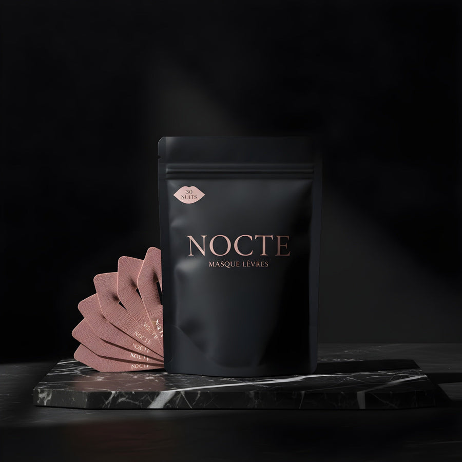 Le sachet NOCTE et les masques déployés sur un marbre sombre